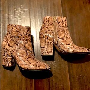 Steve Madden snakeskin heeled booties. Size 7